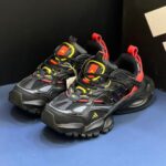 آدیداس رانر اکس ال جی دیلاکس مشکی قرمز طلایی adidas XLG Runner Deluxe Black Gold Metallic Red
