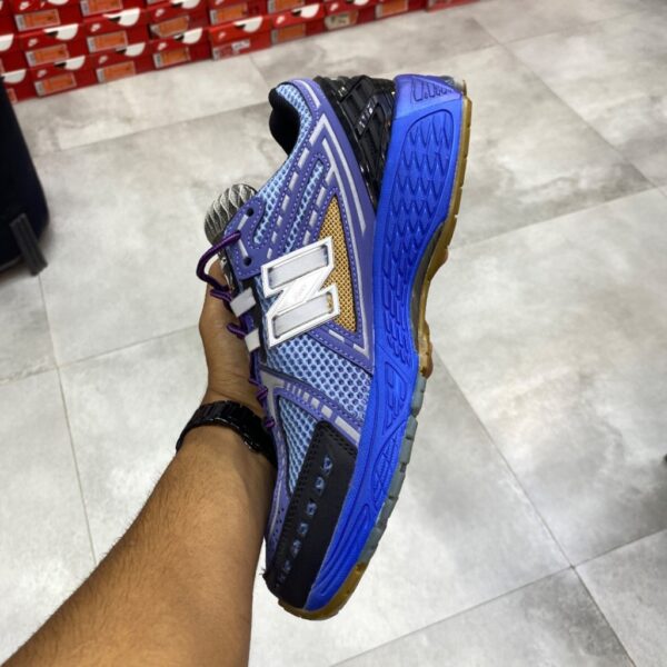 15989387 کفش نیوبالانس New Balance 1906R Action Bronson Medusa Azul
