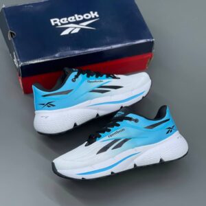 18610502 ریباک زیگنیشن سفید آبی مشکی Reebok Zignition White/Future Cyan