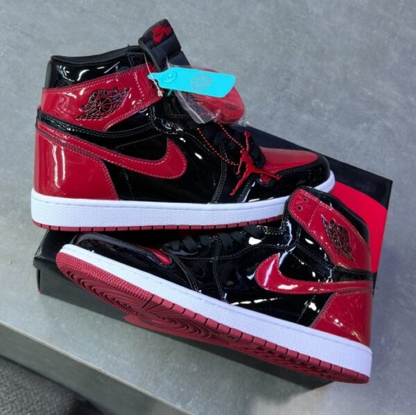 IMG_1101.png کفش نایک ایر جردن وان ساقدار ورنی مشکی قرمز ( مستر کوالتی ) Nike Air Jordan 1 High Patent Bred