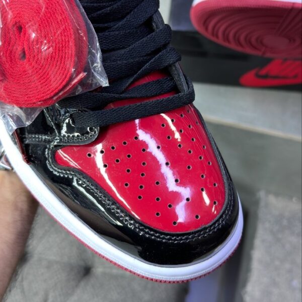 IMG_1102.png کفش نایک ایر جردن وان ساقدار ورنی مشکی قرمز ( مستر کوالتی ) Nike Air Jordan 1 High Patent Bred