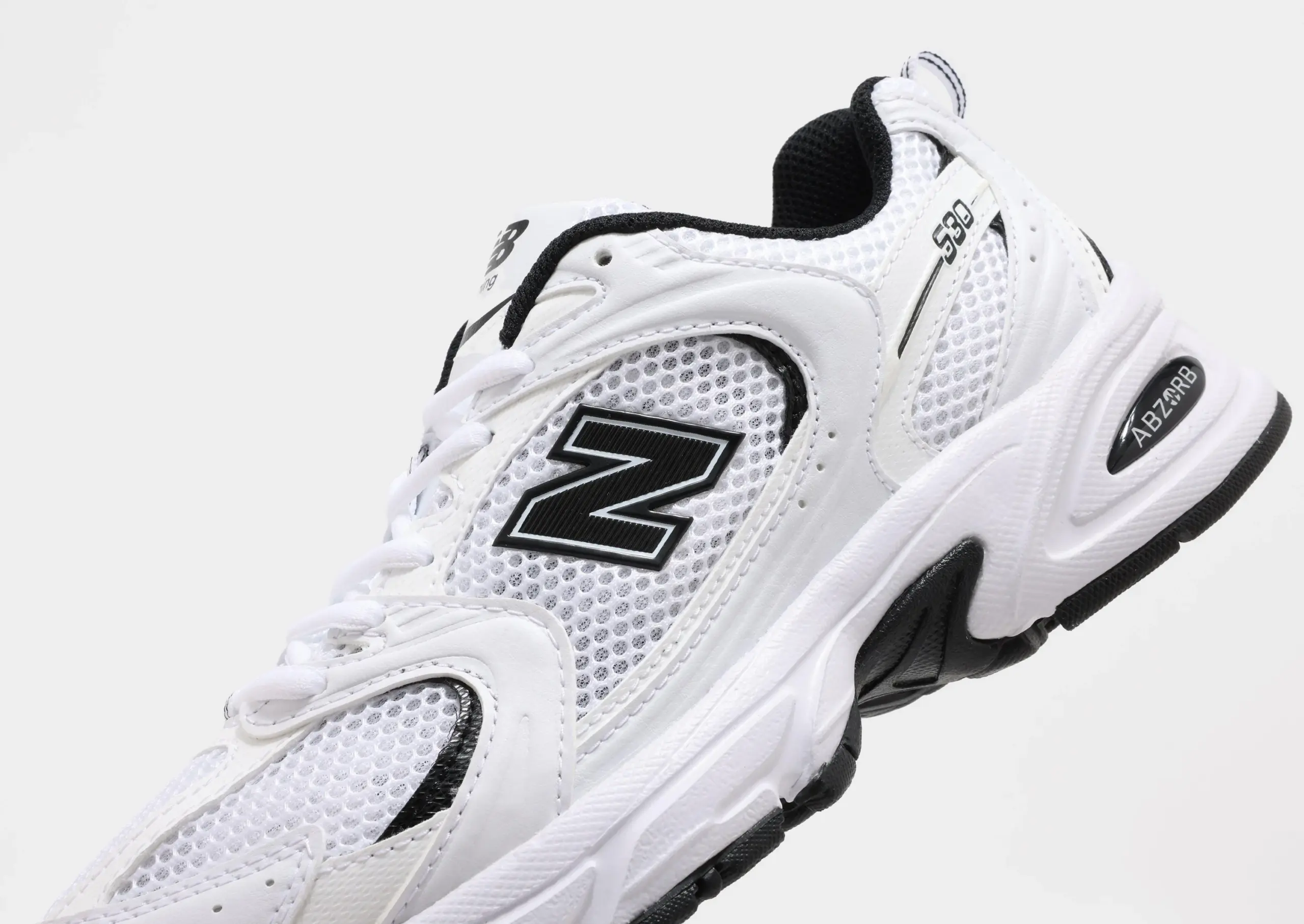 4f43f121e8571ba26e45df0c7de2cc83-scaled کتونی نیوبالانس 530 سفید مشکی-New Balance 530
