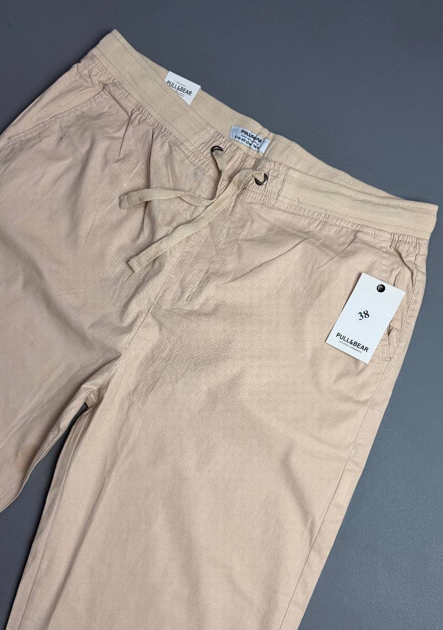 5875324715163914208 شلوار کنف pull&bear کمرکشی اورجینال سفارش اسپانیا کرمی کد 2050