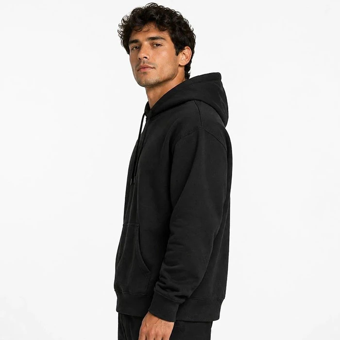 Original-mens-basic-black-fleece-lined-hoodie-by-Zara-Spanish-market-stock-features-a-heavyweight-fabric-and-a-relatively-relaxed-fit.-Code-216.-3 هودی داخل کرکی اورجینال مردانه رنگ مشکی بیسیک گرم بالا برند Zara سفارش اسپانیایی تنخوری و قواره نسبتا آزاد کد 216