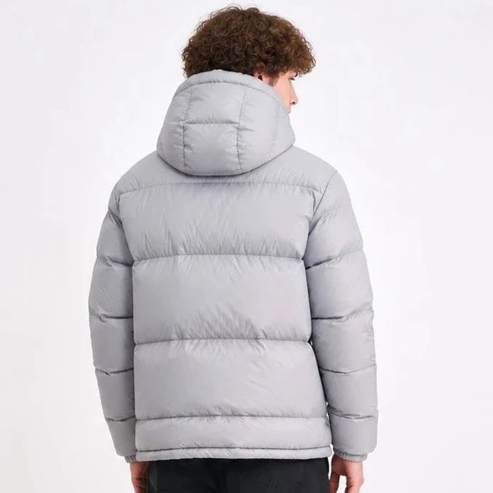 Original-mens-puffer-jacket-by-Chevigon—a-French-market-model-in-a-popular-cement-gray-color.-It-features-a-relatively-relaxed-fit.-Code-191-2 کاپشن پفی اورجینال مردانه رنگ پر طرفدار طوسی سیمانی برند chevigon سفارش فرانسویی تنخوری و قواره نسبتا آزاد کد 191
