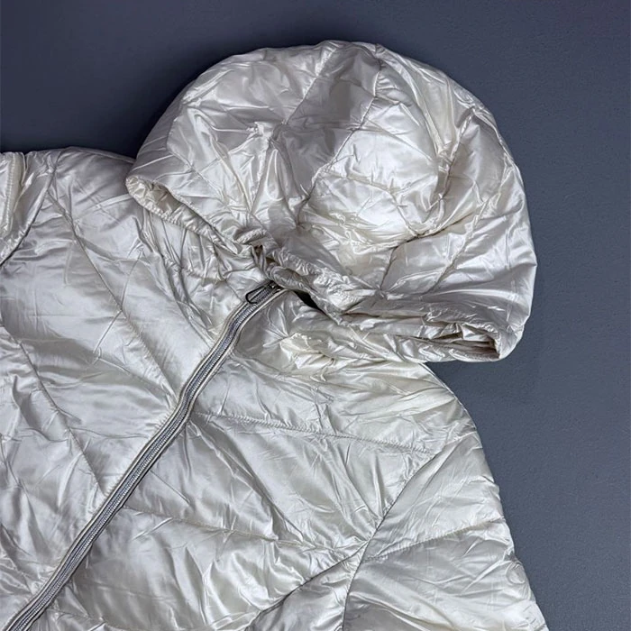 Stylish-original-womens-mid-length-jacket-in-an-off-white-milky-shade-by-Tom-Taylor-German-import-features-a-relatively-standard-fit.-Code-186-4 کاپشن نیمه لانگ اورجینال زنانه رنگ شیری شیک برند Tom Taylor سفارش آلمانی تنخوری و قواره نسبتا استاندارد کد 186