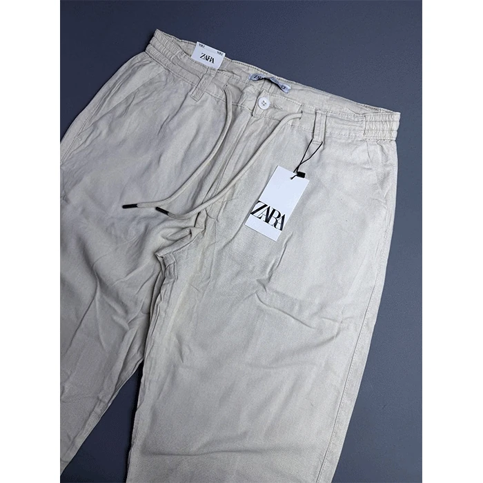 شلوار لینین اورجینال مردانه رنگ کرمی برند Zara سفارش اسپانیایی مدل نیم بگ کد 2032